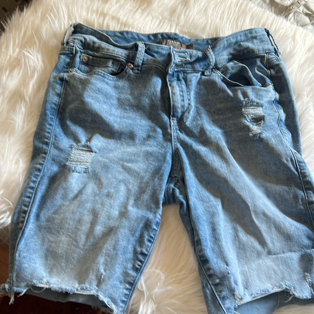 Distressed denim shorts